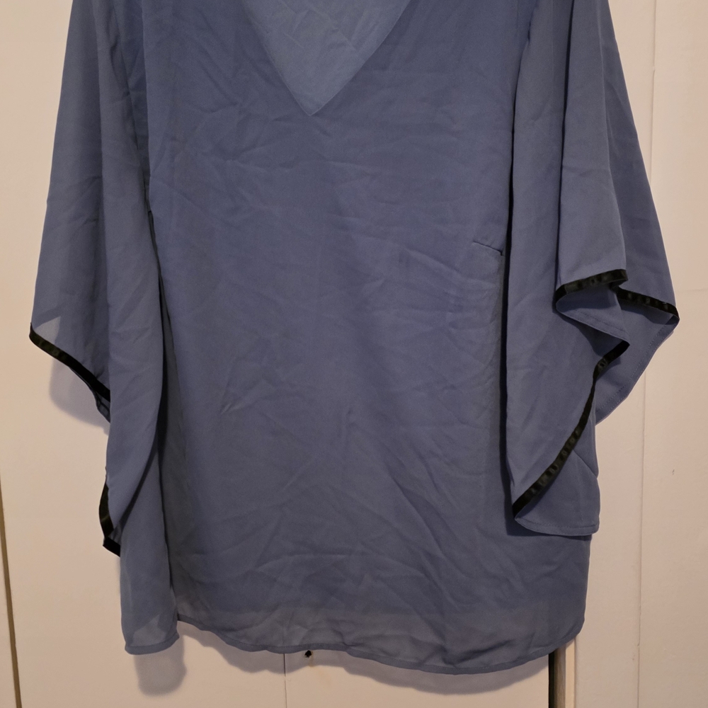 BloomChic Flowing Blue Blouse with Black Trim